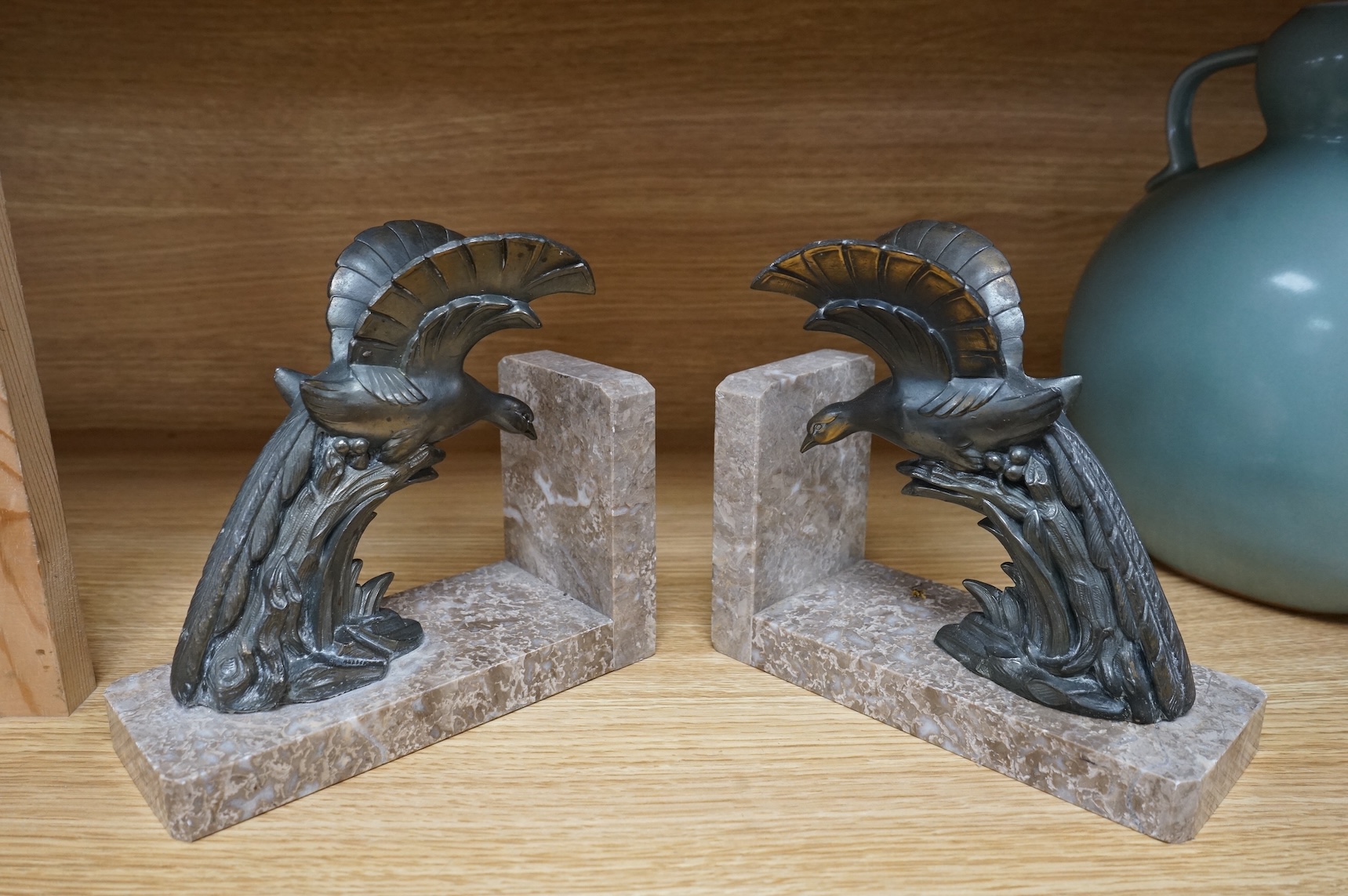 A pair of French Art Deco style spelter bookends, 18cm wide